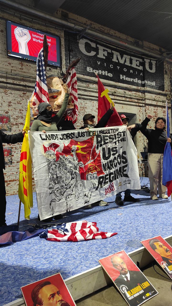 Anak Bayan members hold a banner which reads "Resist the US-Marcos Regime"