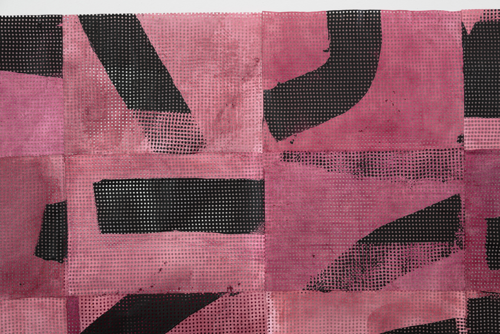 Pink and black abstracted text detail from work of artist Julia Boros