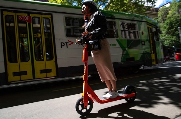 The Age: 'Thousands jump on city’s e-scooter trial' 4 Feb 2022 Photographer Penny Stephens