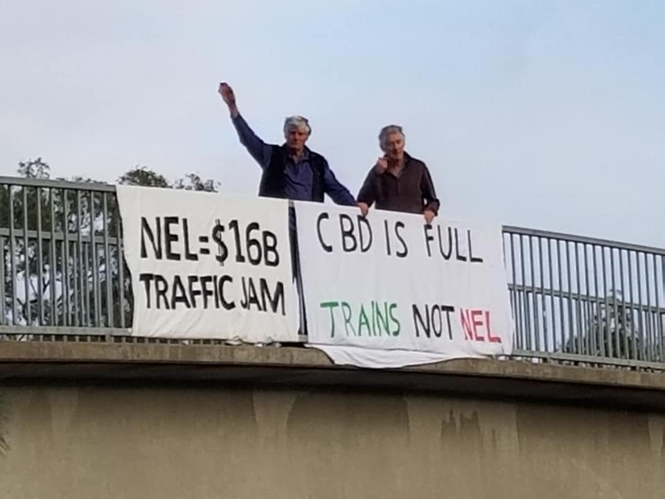 Banner Drop over Ester Freeway