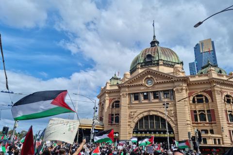 Peaceful protestors wave a plethora of Palestinian flags at the Free Palestine rally on October 6th 2024 outside Flinders Street Station