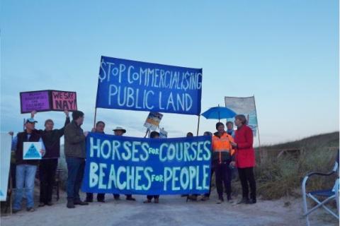 Greens Senator Janet Rice speaks to a demonstration at Killarney Beach against use of Public Places being dominated by commerical interest