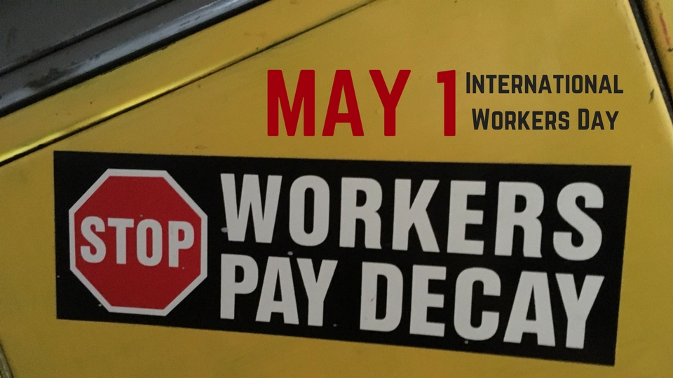 'Stop workers pay decay' sticker.