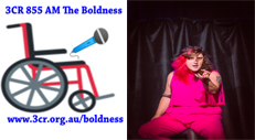 A wheelchair holding a microphone pointing to Tricksy Collins(Star of Assigned Magician) wearing a pink dress 