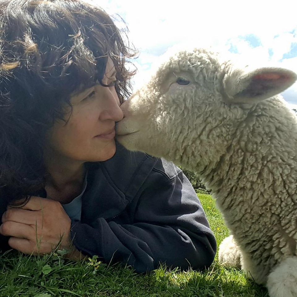 Image of Robyn with Ben, one of the lambs she raised. Image supplied by Robyn.