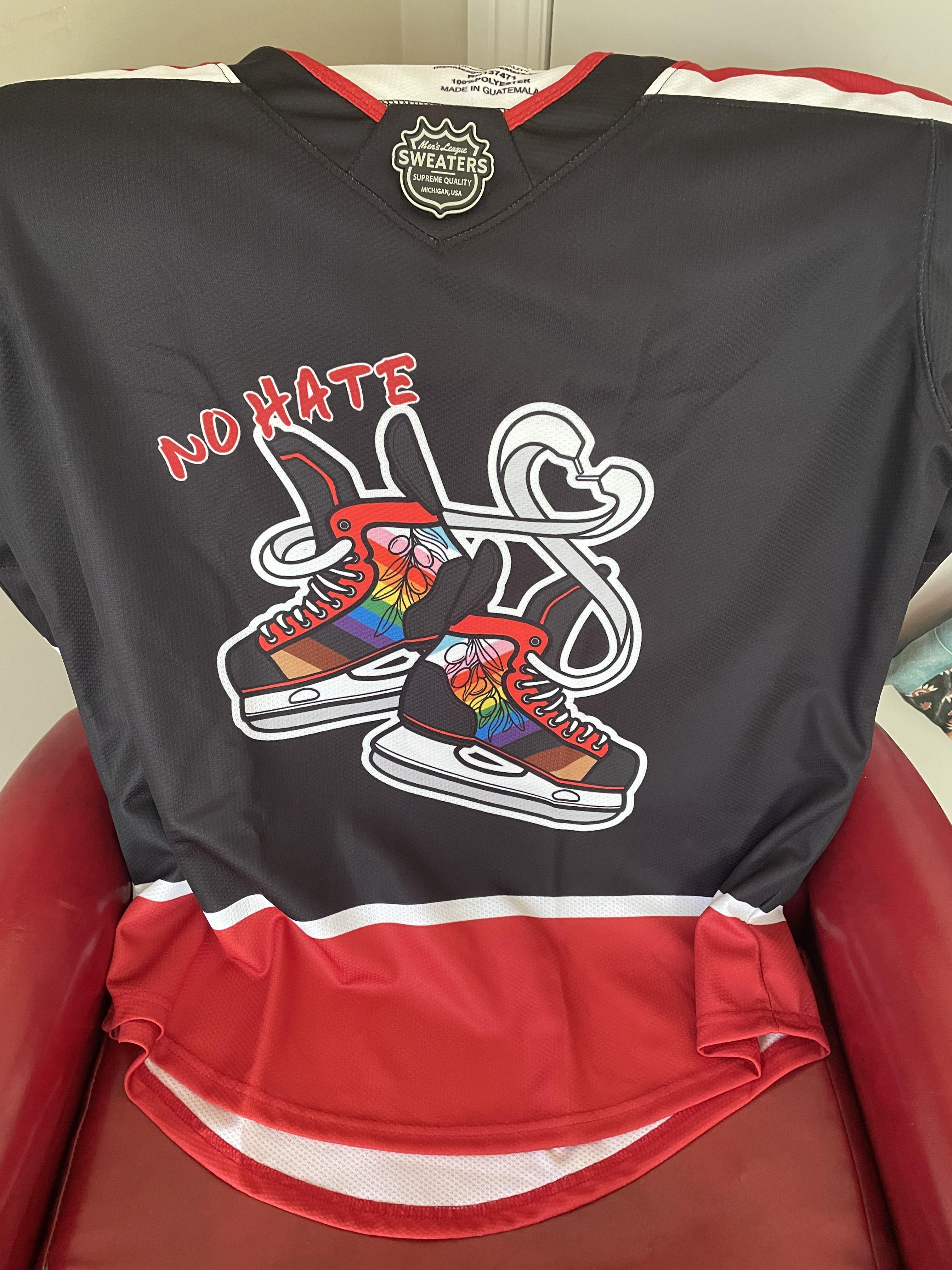 Claire's player's against hate hockey jersey