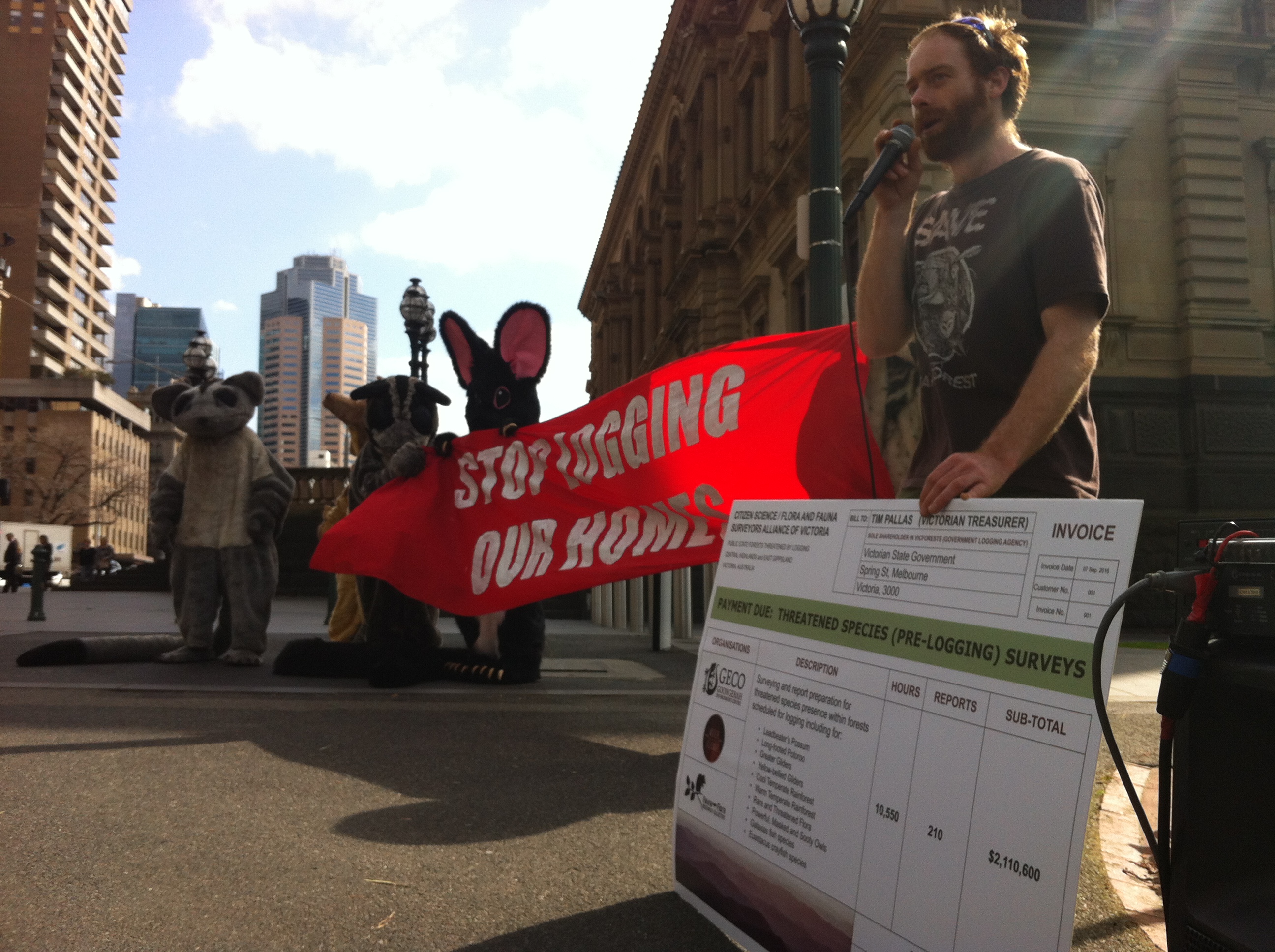 Ed Hill with citizen scientist invoice at the Threatened Species Day action 2016.