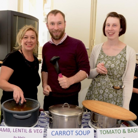 Melis, Shane and Naomi from HAAG serve soup at a recent general meeting