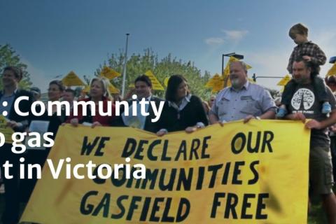 A photo of many people of all ages standing in front of a tractor and holding placards, with many people holding a large handmade banner in the foreground which reads: WE DECLARE OUR COMMUNITIES GASFIELD FREE. There is sext superimposed over the photo which reads "No More Gas: Community Resistance to gas development in Victoria.