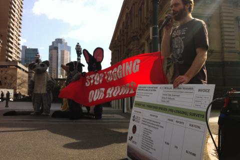 Ed Hill with citizen scientist invoice at the Threatened Species Day action 2016.