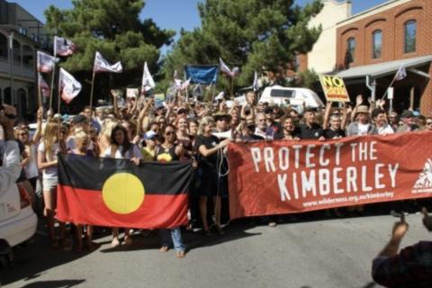 protest outside Buru office West Perth large with banners including Aboriginal flag