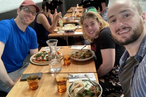 Nick, Lottie and Hayden eating at a restaurant