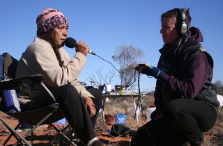 The Radioactive Show's Jessie Boylan interviews Sue Hasseldine at Lizards Revenge festival and protest, Roxby Downs, 2012. Photo by Gem Romuld.